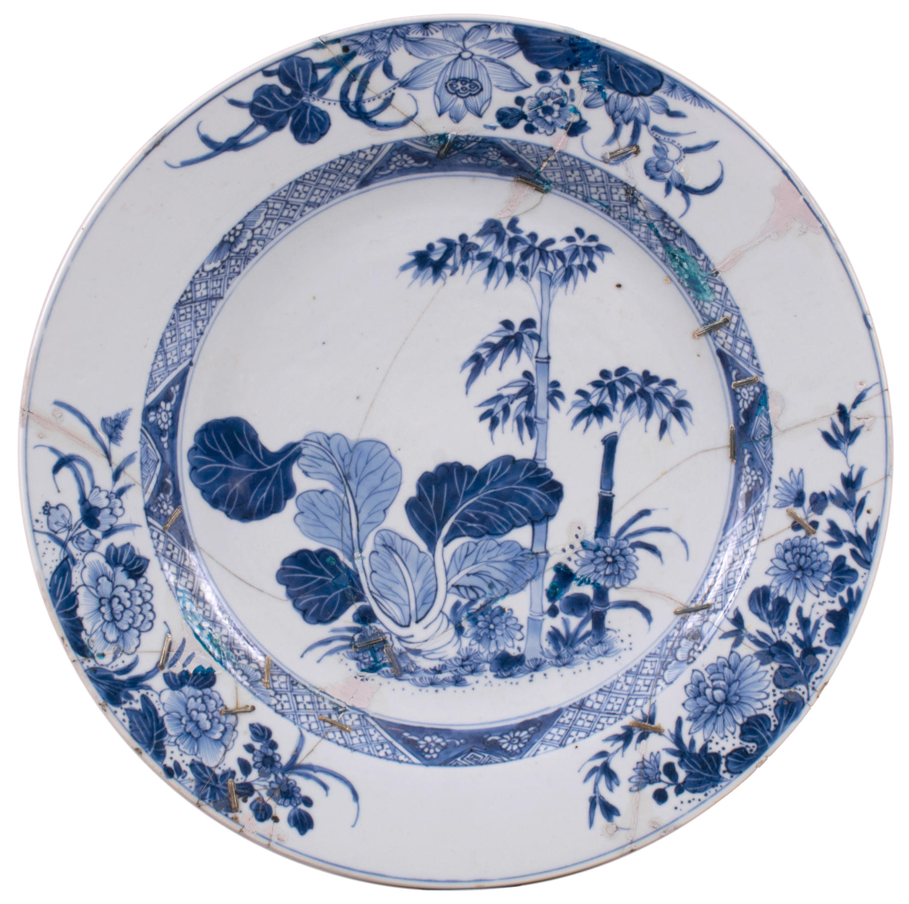 Chinese Export Pseudo Tobacco Leaf Charger with Staple Repairs, c. 1750